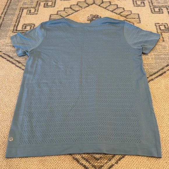 Lululemon size 6 tees in coral and sea foam. Both are in Great condition - Picture 7 of 8